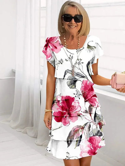 PLISSEE KLEID MIT RÜSCHEN UND BLUMENMUSTER