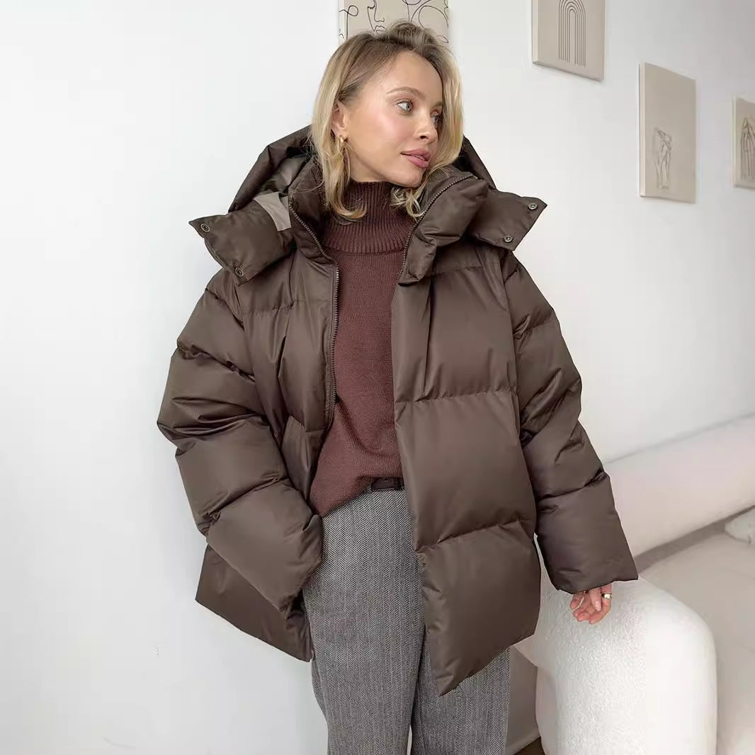 Gina® | Warme Steppjacke im modernen Stil mit abnehmbarer Kapuze